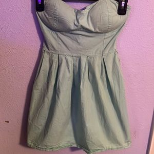 Strapless blue dress. Size small. Open flare at the end of the dress.